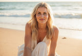 Brittany Ford on the beach at sunset, The LongHer Life podcast
